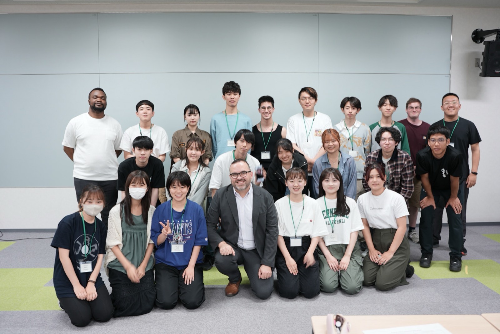 Michal Mazur with a diverse class of students at APU.