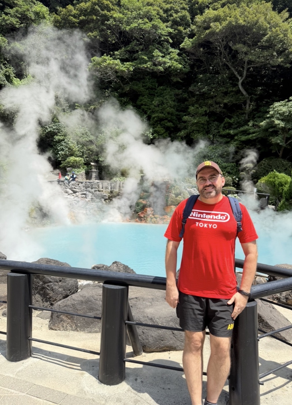 Michal Mazur beside a steaming hot spring in Beppu.