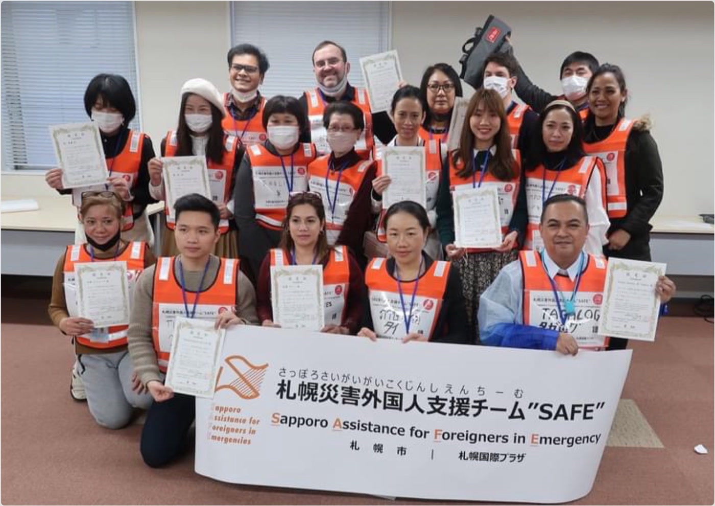 SAFE emergency support team members after completing training in Sapporo.